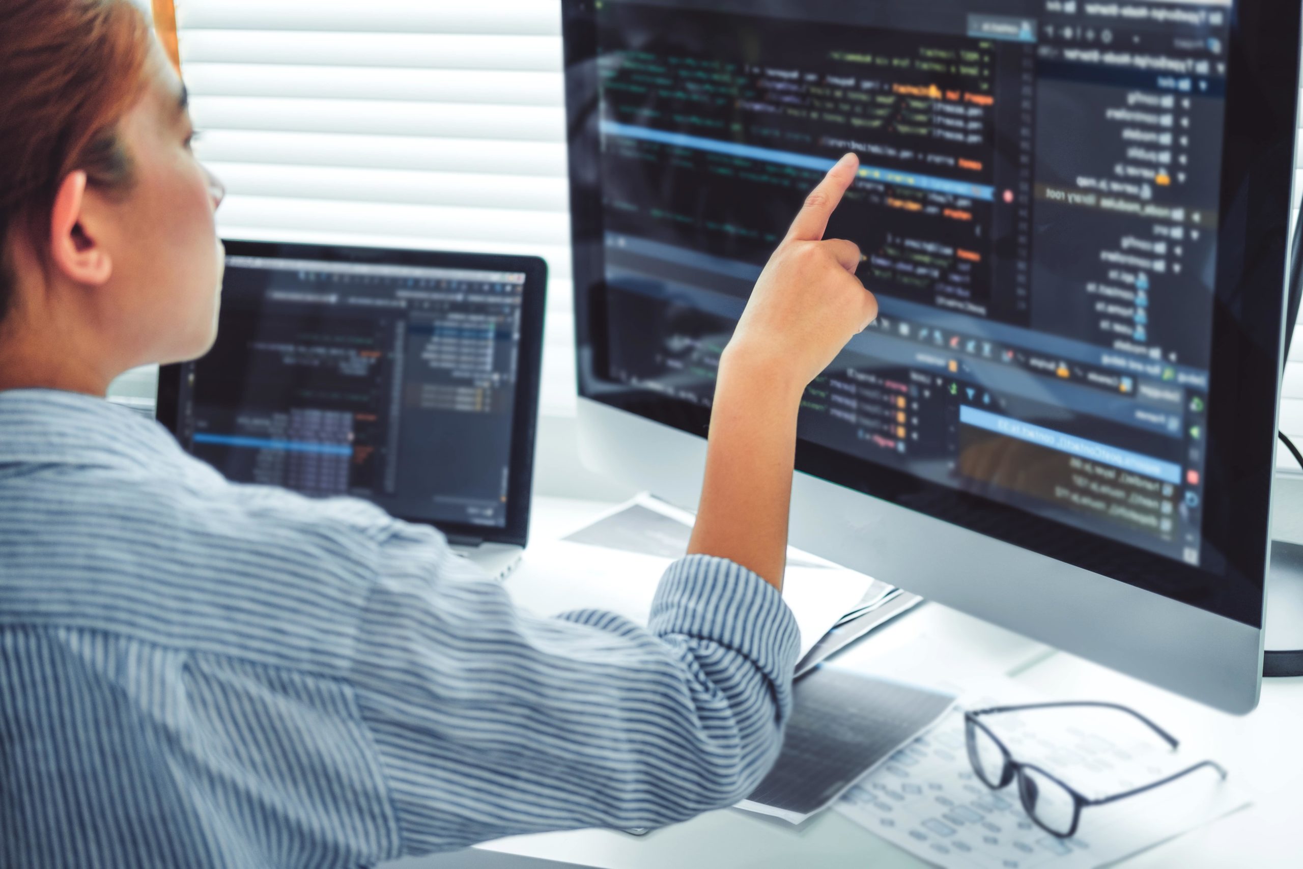 developing-programmer-working-with-laptop